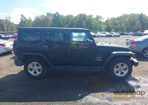 2015 Jeep Wrangler Unlimited Sahara from USA, damaged, VIN 1C4BJWEGXFL557844